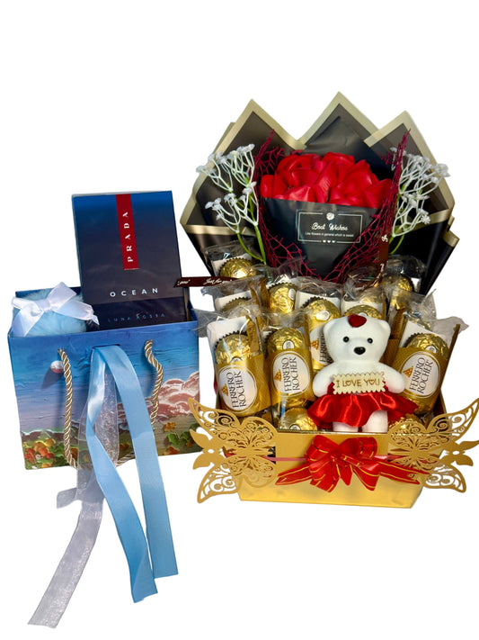 Gift basket with teddy bear, flowers, and Prada box on a white background